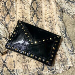 Stunning Elaine Turner black patent leather clutch with gold embellishments.NWOT